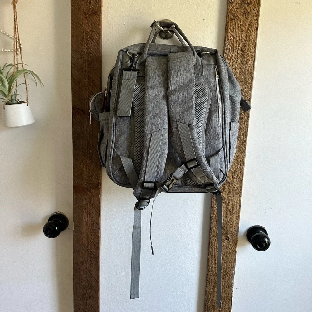 Boutique Large Diaper Bag, Backpack, Bassinet, Tech Charging Station all in one